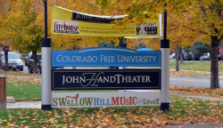 Sign showing “Colorado Free University” and “John Hand Theater”.  [George Blood]