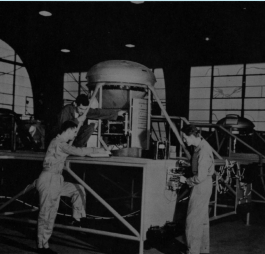 Students study using Training Aids Dept. constructed B-29 Central Fire Control System