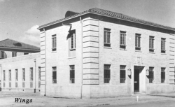 Photo date is 5 May 1941.  Note bars on the windows, this was a secure building for the 1910th Communication Squadron with possible telephone switch board.  [Wings]